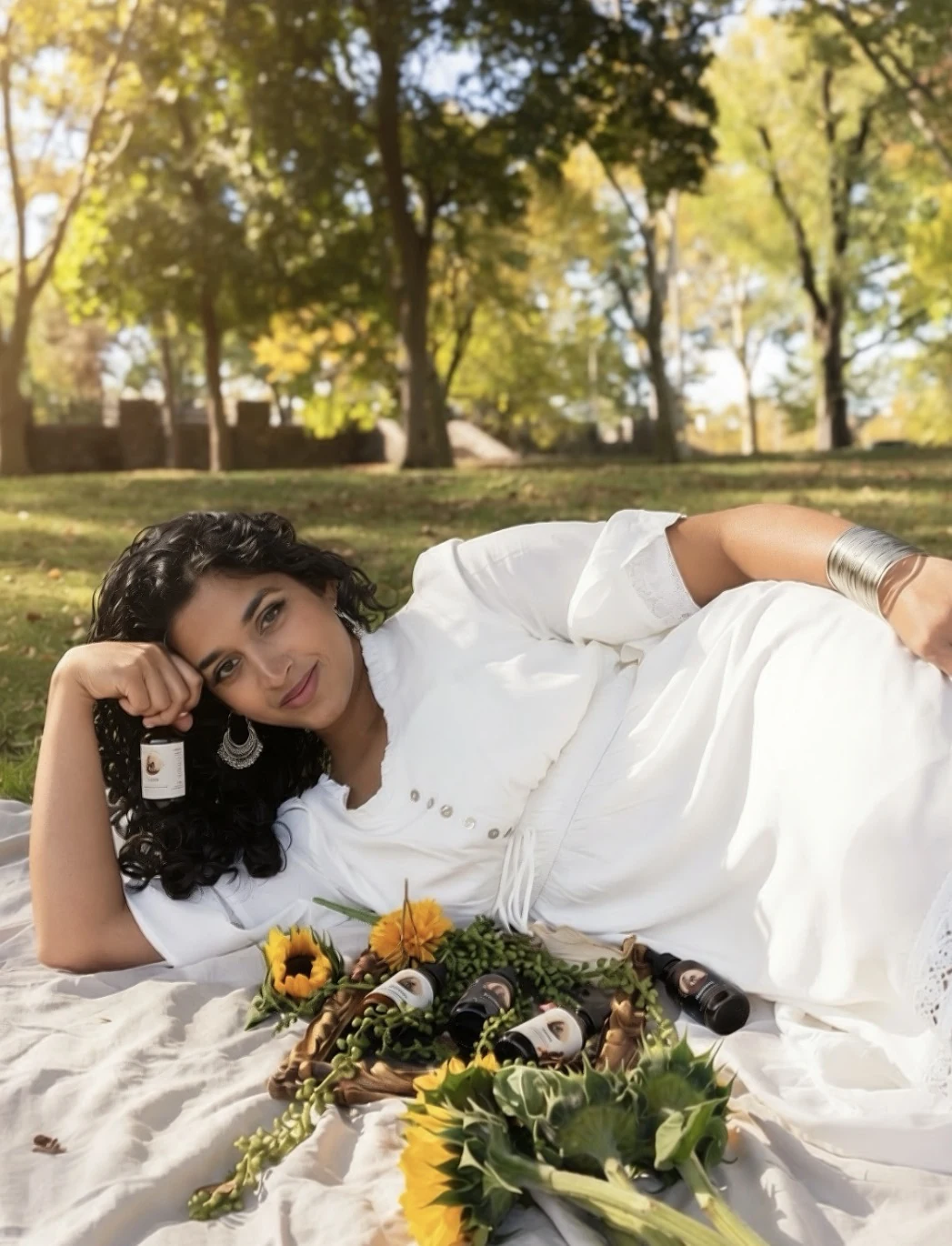 Sana, founder of Ammi's Essence, with her handmade hair oils